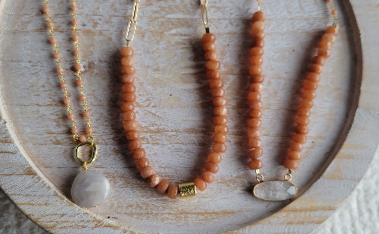 Peach stone necklaces