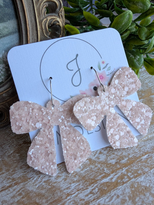 Blush Glitter Faux Leather Bow Earrings